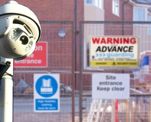 Warning signs and cctv on a building site